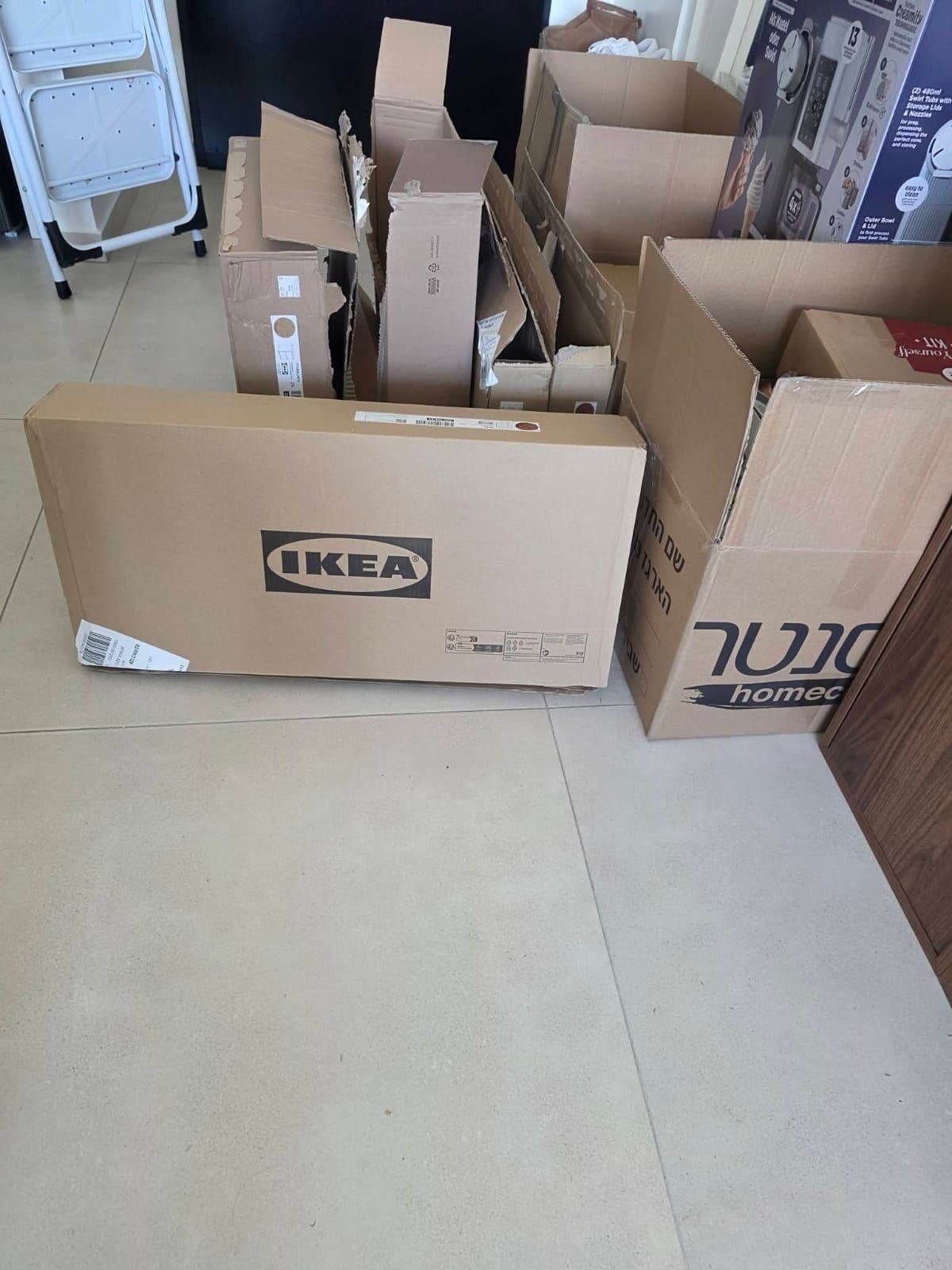 Flat-pack furniture boxes waiting to be assembled